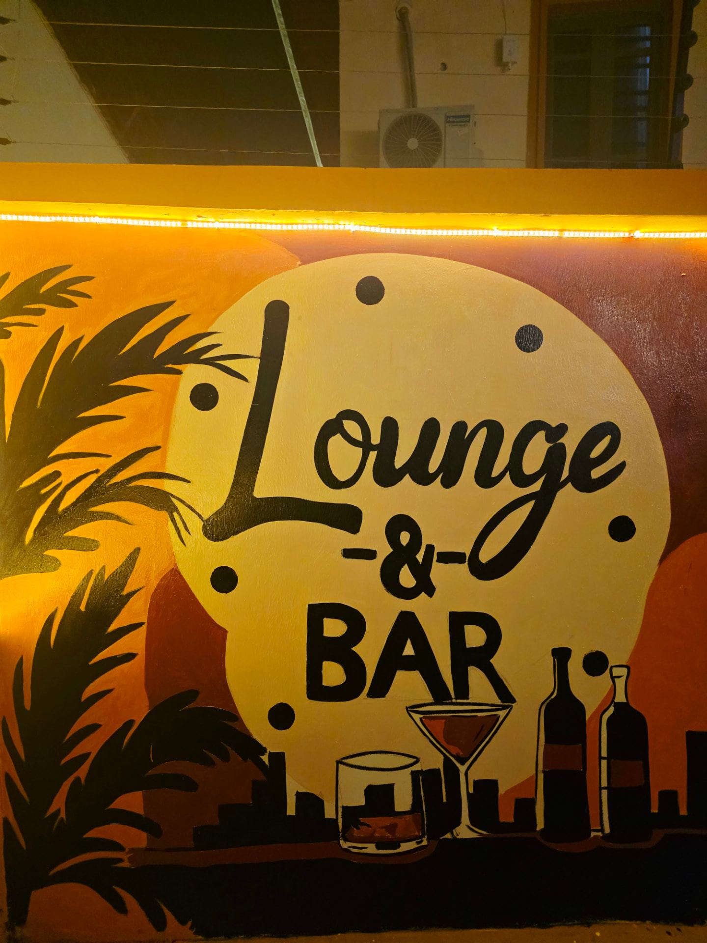 Lounge and Bar wall artwork at Quille Hotel & Lounge